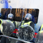 By Lee Harper By Lee Harper. Student Protests: Riot Police get covered with paint bombs thrown at them as students protest about the rise in university fees in December 2010.